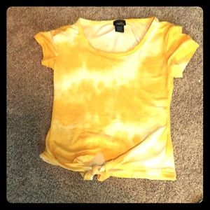 Tidied yellow tied shirt